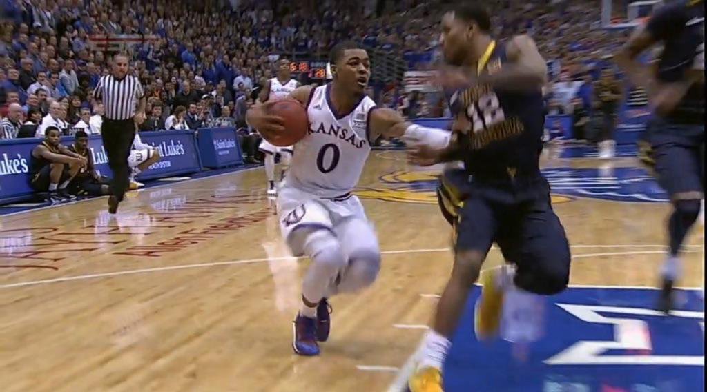 Now rewatch that gif, but now watch how Tarik is flying off screen at the beginning of it. How in the name of Isaac Newton is he moving like that, you ask? Well, Frank Mason %#$&ing trucked him with a LaDainian Tomlinson stiff arm