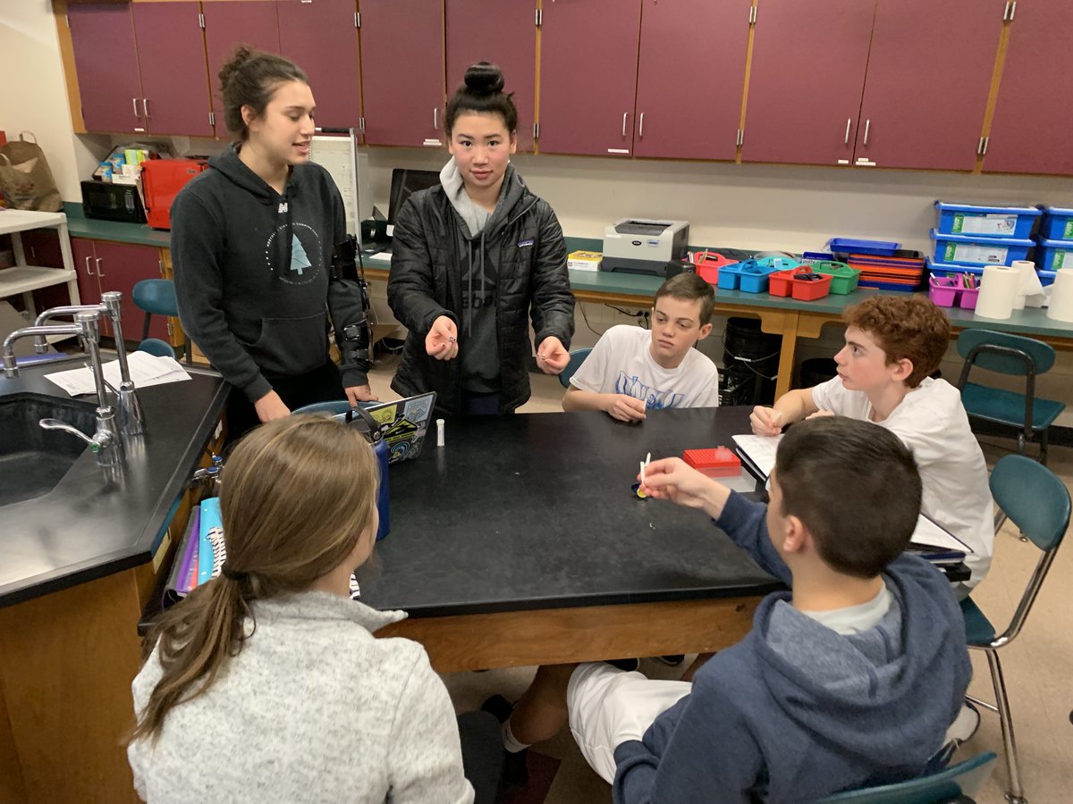 DolanBio's tweet photo. AP bio students teaching 8th graders micropipetting and PCR https://t.co/pjsaKSxBn9