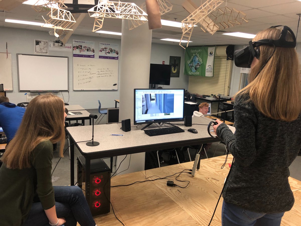 shelbycountysch's tweet photo. @MLCHS_Principal students Leslie and Lindsey Overstreet,and teacher @Yodas_minions are enrolled in a dual credit class at EKU entitled Society and Technology. Students can use VR for field trips to the White House, to perform a surgery and to manipulate DNA. #SCThinksBigger #IL3 https://t.co/TfZGULkOL2