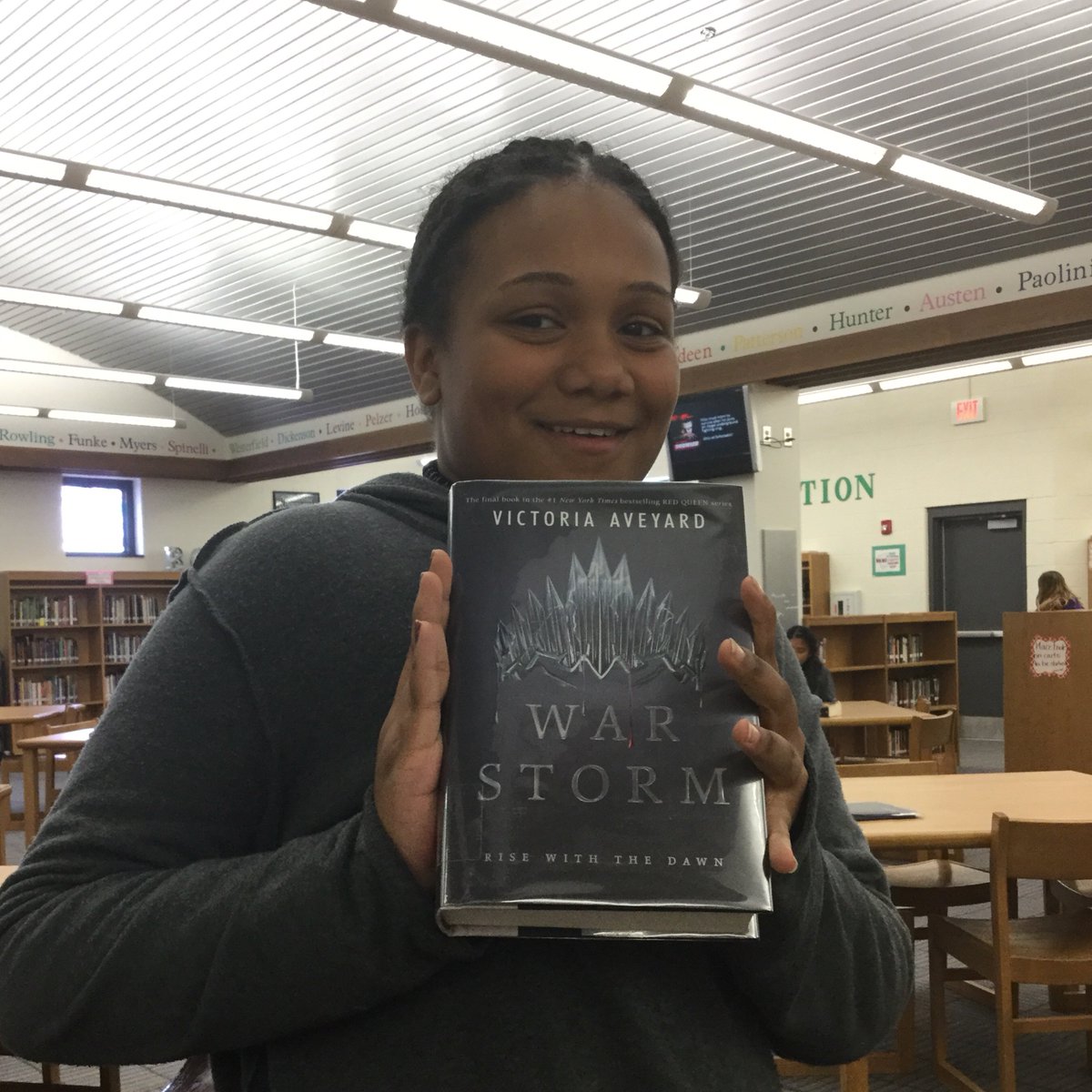 DCMSMediaCenter's tweet image. This 7th grade student was so excited to find book 4 of “The Red Queen” series on the NEW book display that it resulted in huge smiles, high fives, &amp;amp; a photo op!  #RHSDLibraries  #ThankfulForSchoolLibraries  #NEWbooks  #RedQueen  #VictoriaAveyard  #HappyDance