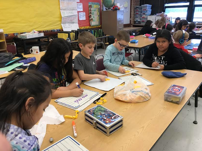 RyanHart2013's tweet photo. Mr. Moran running small groups for literacy &amp; using total physical response (TPR) strategies to help students understand new vocabulary words.  #GLAD  #TPR  #wcusd200 https://t.co/4RvTxbjXPR
