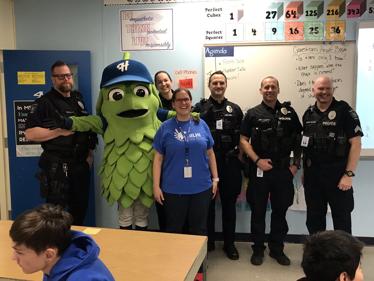 eagles_ems's tweet photo. Our own Officer Mox flexing his brain today in @HartKMath’s math class today @HilhiSparts! Special guest appearance by @BarleytheHop...just checking in to encourage collaboration! @HilhiVickery @HillsboroPolice https://t.co/pJjBetIswF