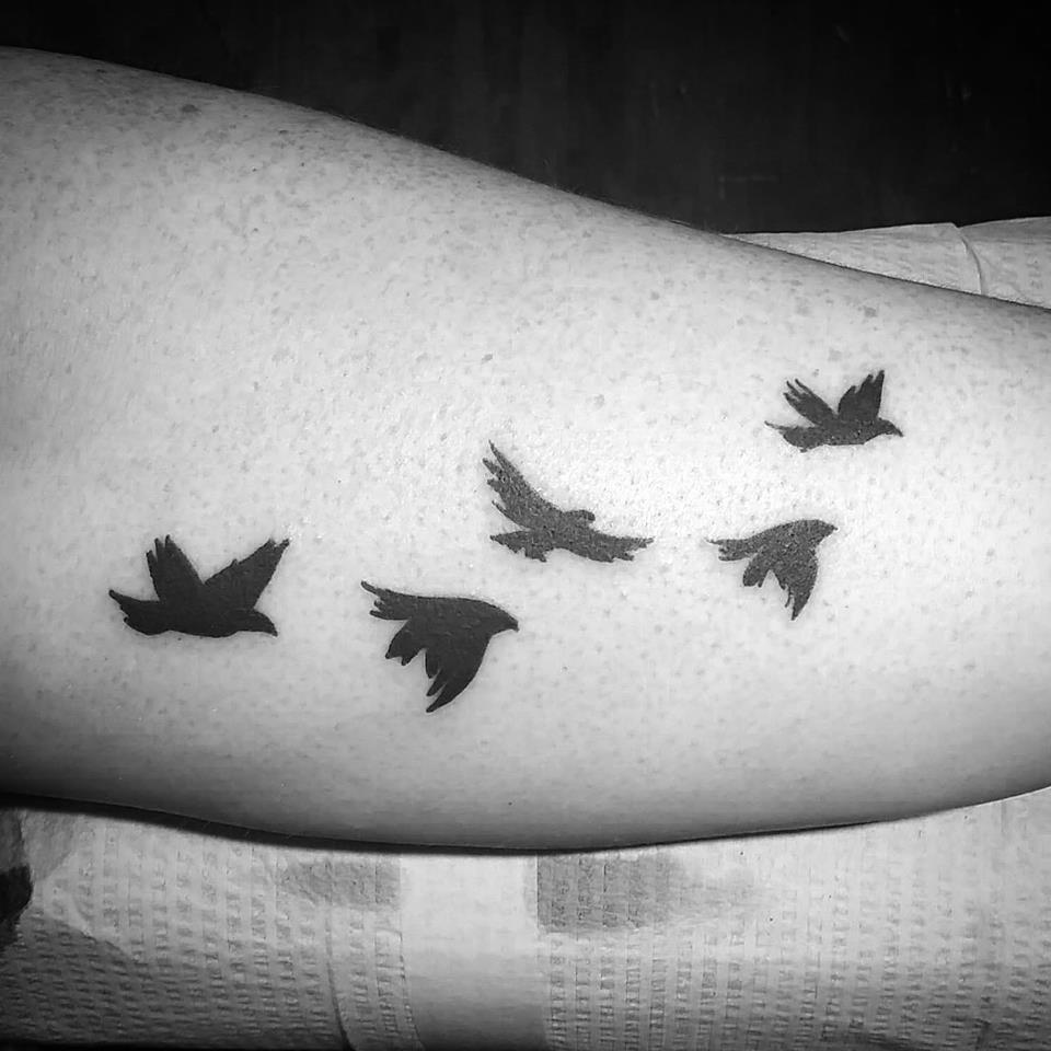 Two Mynah birds on each side of chest tattoo idea | TattoosAI