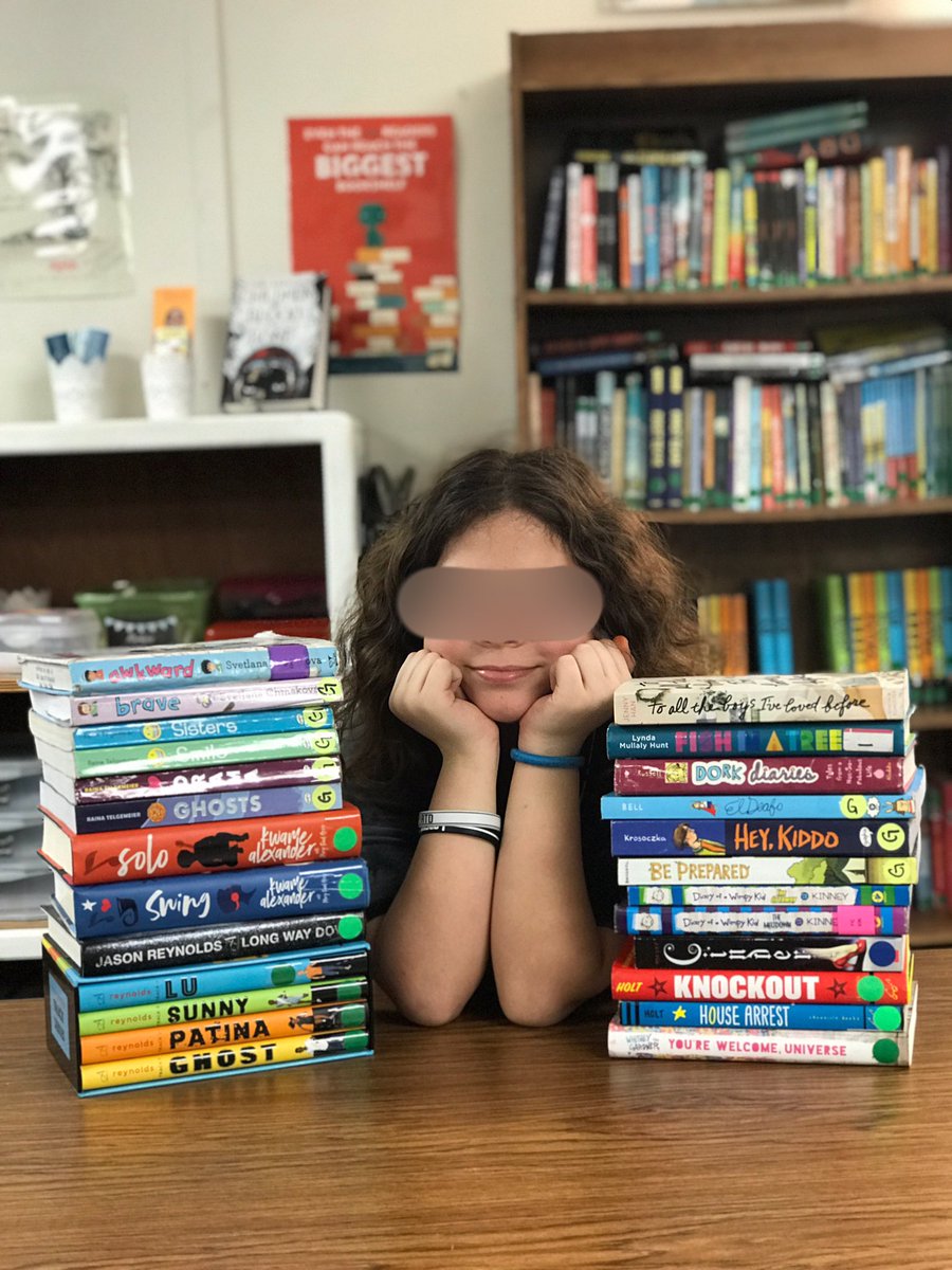 BlackwellReads's tweet photo. One of my readers is moving to a new school, so she wanted to take her end of year book stack pic today. I’m so proud of how much she’s grown &amp; read this year! *5 books are missing from her pic b/c other Ss are currently borrowing them* #buildyourstack https://t.co/kxs3nhcfJ6
