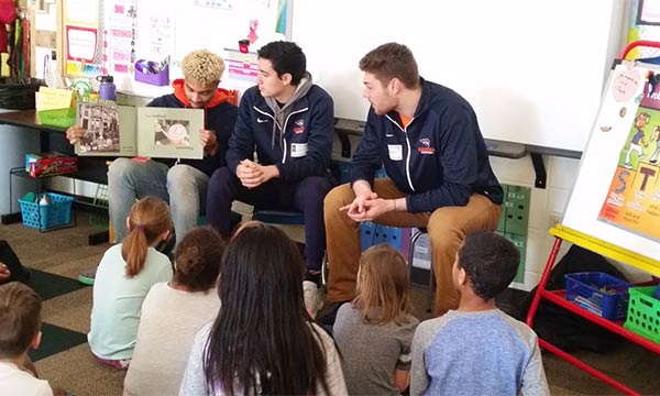 Pio men's basketball players visited Waukesha's Whittier Elementary today to read to third graders with the Sharp Literacy Project. Way to go! #GoPios #CarrollU