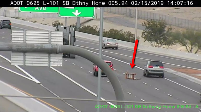 ArizonaDOT's tweet photo. L-101 Agua Fria NB: A chair is in the road between the right two lanes approaching Maryland Avenue. #phxtraffic https://t.co/LAA6HGrwAQ