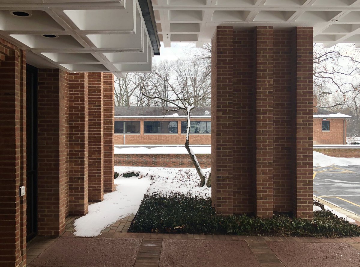 My favorite part of the OHSAA building is the subtle asymmetry, like the different column design on each side of the entryway.