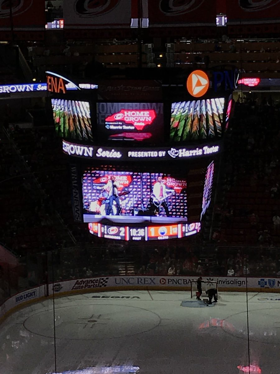 TheOtherLori's tweet photo. Who knew hockey games were so much fun? Live concert &amp; hockey in one! Oh &amp; they have cheerleaders? #1sthockeygame #hurricanesvsoilers https://t.co/uJqAK2hKcz