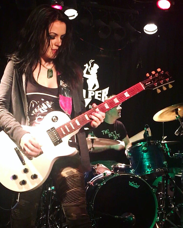 Rose and I are in love with our new <a href="/RoadieGearWorks/">Roadie Gear Works</a> custom guitar strap 😍 So honored to be part of the #RoadieGearWorks family 🥳 #GearMyRoadie #Gibson #Epiphone #LesPaul