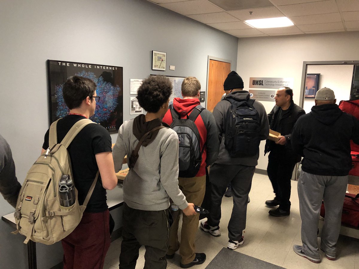 UMSL_IS's tweet photo. Dr. Shaji Khan serving dinner to the participants at #umslhack2019 @UMSLBUSINESS #WeTransformLives https://t.co/N8uuO4lmlX