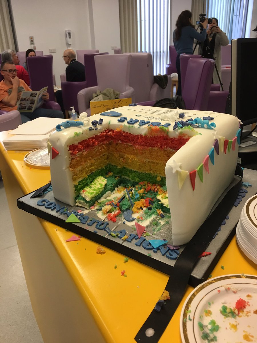 Enjoying the rainbow cake #openday