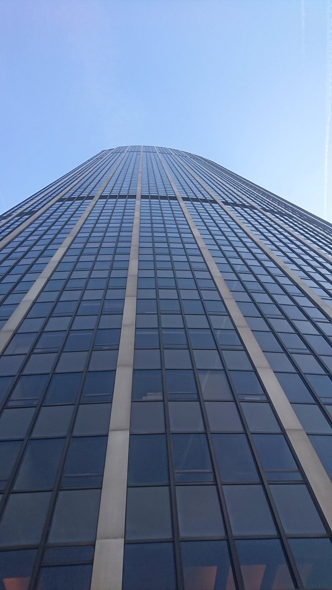 Q3_Paris19's tweet photo. La Tour Montparnasse: our next stop was the Montparnasse, the highest tower of Paris. Our students went up to the top floor (58th) and some even braved it to the roof terrace! Here is the view from the bottom 😱 https://t.co/nEGWkngz03