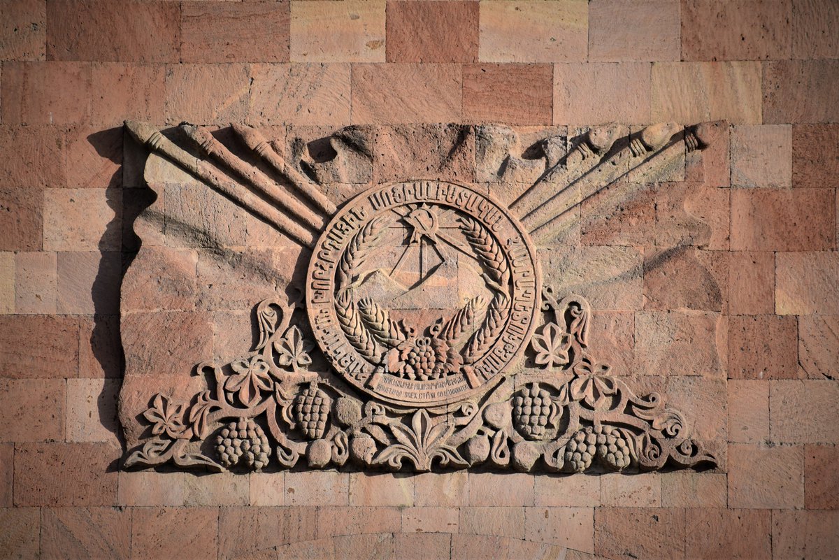 the coat of arms of Soviet Armenia on the clock tower of the government building on Republic Square, Yerevan
coat of arms design: Martiros Saryan
architect of the building: Alexander Tamanyan