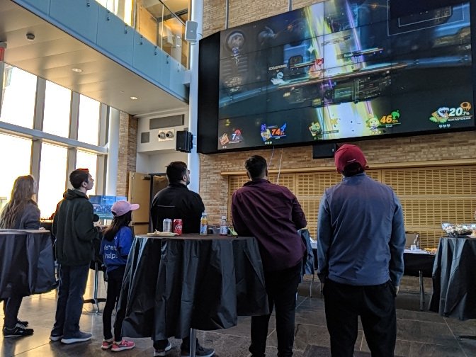 MLHacks's tweet photo. We've never seen a @NintendoAmerica Smash tournament on such a big screen! #hackcewit @stonybrooku https://t.co/0sqTTA4l6l