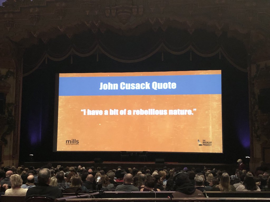 SFoskett's tweet photo. The John Cusack quotes and trivia on screen before #johncusacklive are creepy considering that @johncusack is here and might actually be reading them. I hope he’s having a nice dinner right now. I wouldn’t went to see my own fan crap on screen. https://t.co/Ez0B2gFMZb