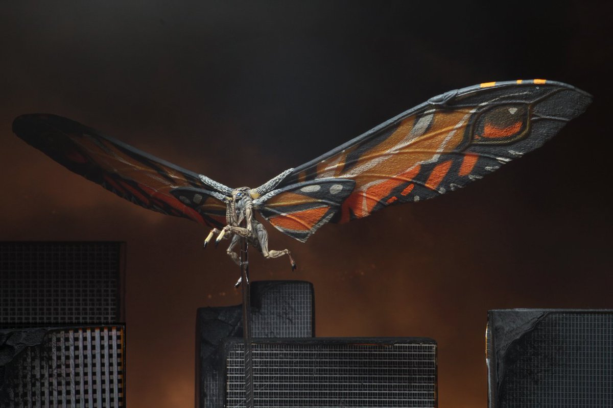 NECA has some higher res studio images of Mothra on their site which offer ...