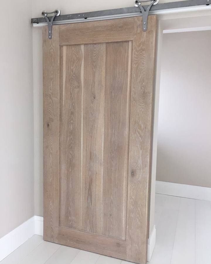 Wide planks create works of art in every form! These interior wood sliding doors are a unique addition to any home. #swwideplank shannonwaterman.com