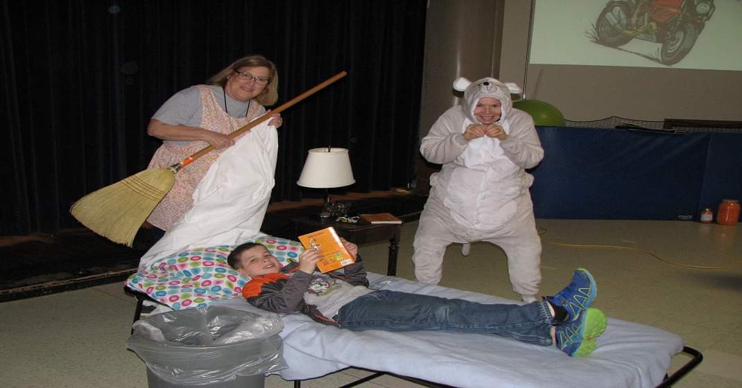 One School, One Book begins! We believe in the power of families reading a great book aloud together.