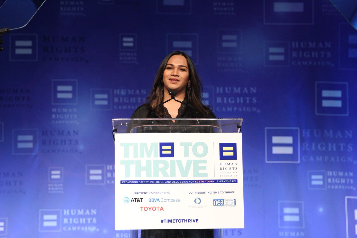 Angel Bonilla on stage at the Time to THRIVE