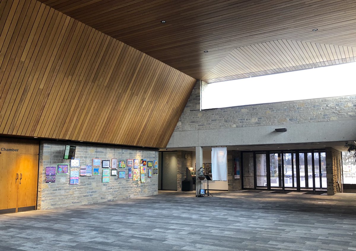 The Municipal Hall has a beautiful interior as well, bringing together the concrete, glass, and limestone with the wood ceiling