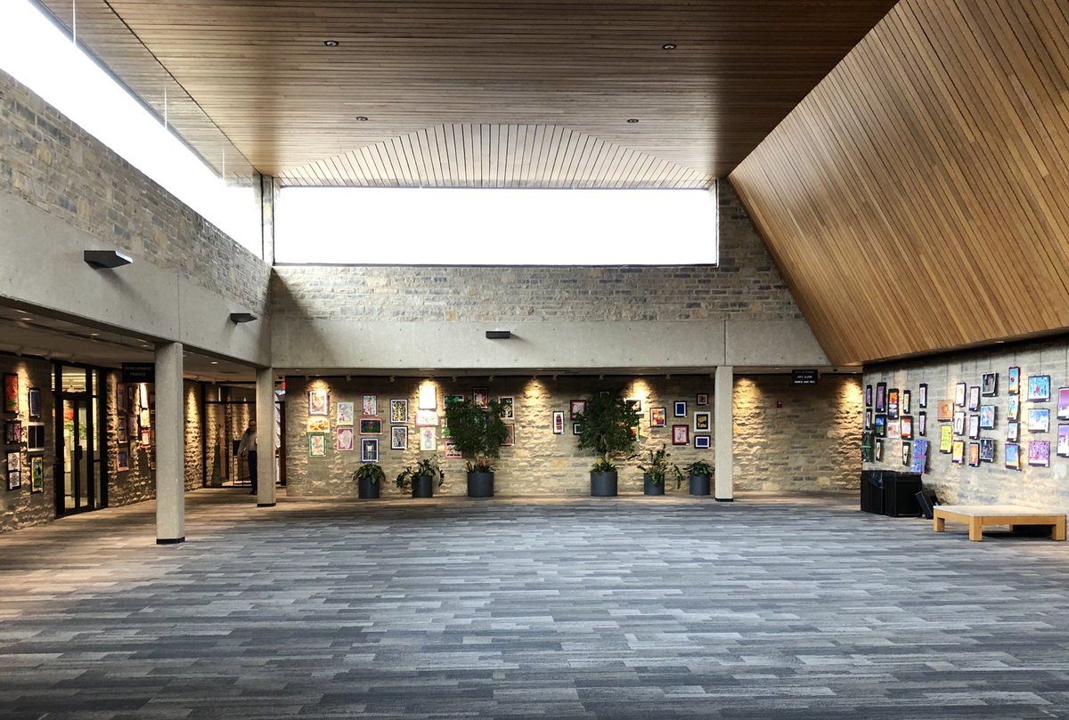 The Municipal Hall has a beautiful interior as well, bringing together the concrete, glass, and limestone with the wood ceiling