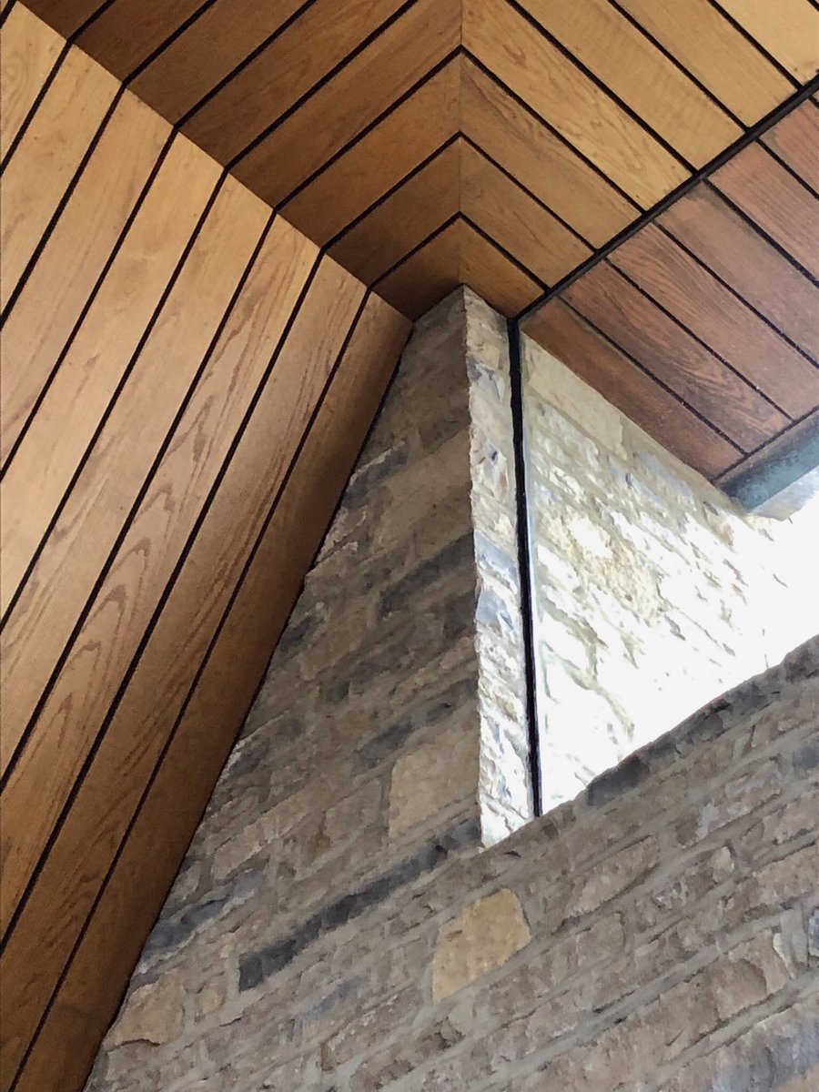 The Municipal Hall has a beautiful interior as well, bringing together the concrete, glass, and limestone with the wood ceiling