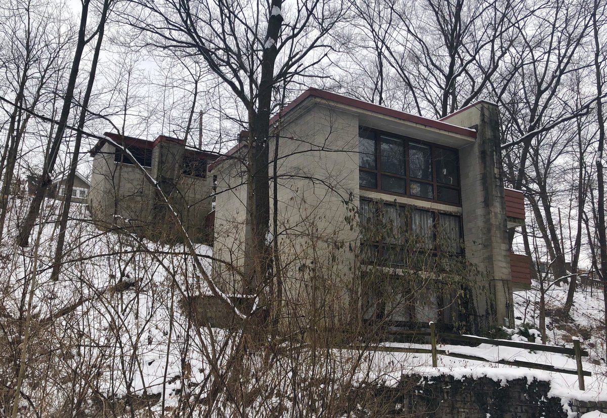 Van Fossen concrete block fortress, circa 1965. This house is along Walhalla Drive, a one way street that winds through a ravine below the surrounding street grid. Apparently the street is also extremely haunted:  http://www.weirdus.com/states/ohio/road_less_traveled/walhalla/index.php