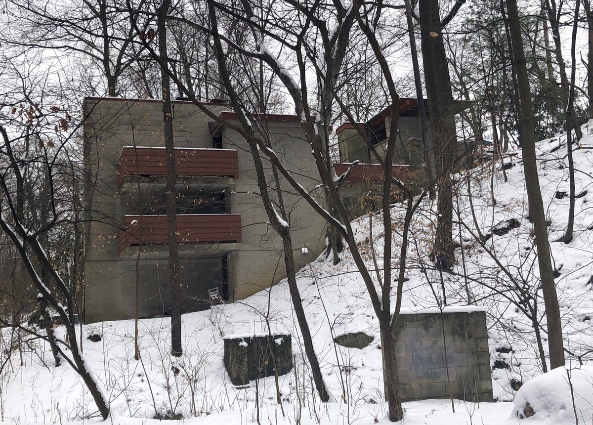 Van Fossen concrete block fortress, circa 1965. This house is along Walhalla Drive, a one way street that winds through a ravine below the surrounding street grid. Apparently the street is also extremely haunted:  http://www.weirdus.com/states/ohio/road_less_traveled/walhalla/index.php