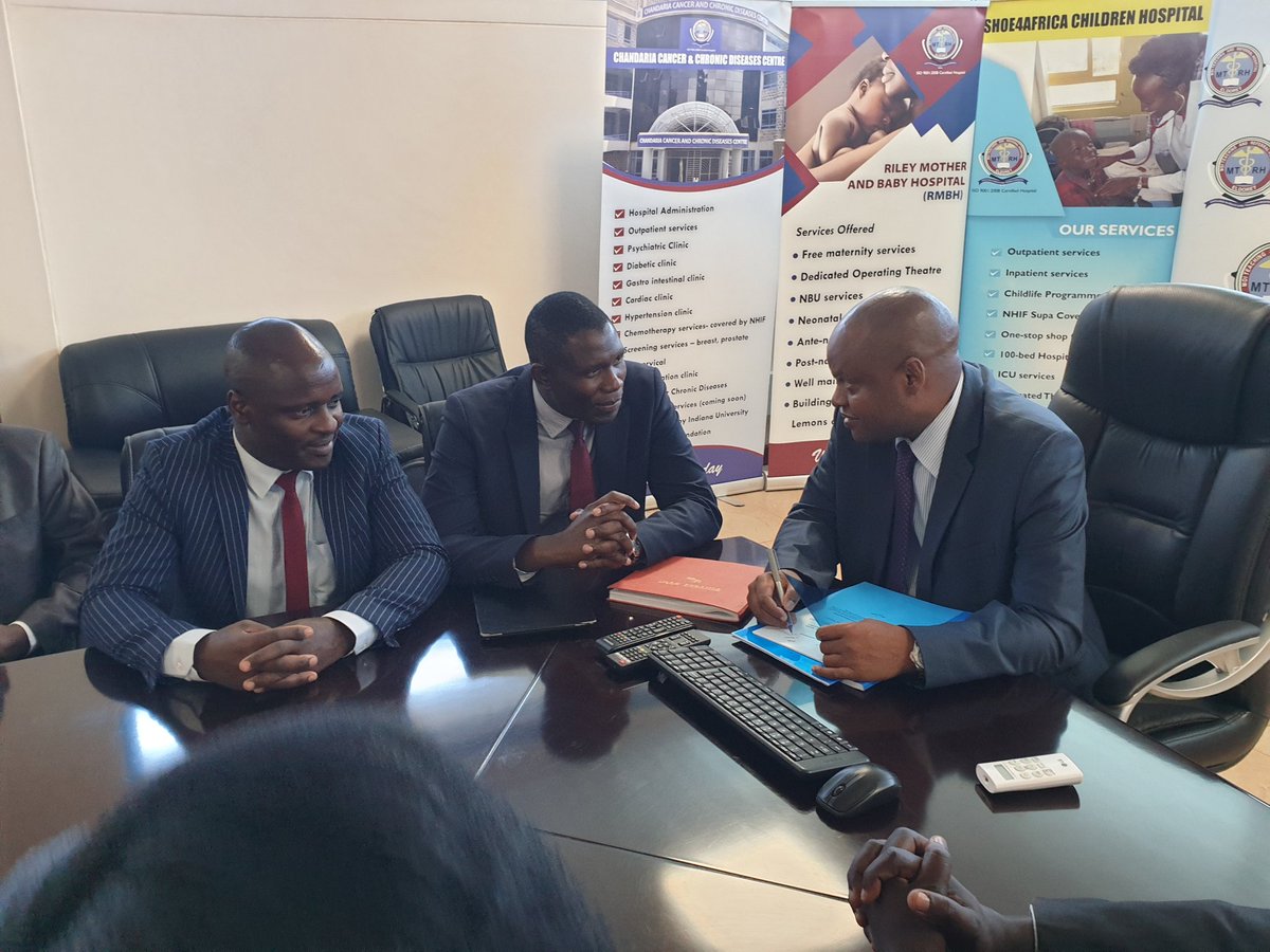Thuranira Kaugiria (@drthuranira) on Twitter photo The CEO of <a href="/MTRHofficial/">Moi Teaching and Referral Hospital</a> Dr. Aruasa Wilson discussing a few issues with <a href="/kmpdu/">KMPDU</a> chairman <a href="/OrokoSamuel/">Dr. Oroko Obegi</a> and secretary general <a href="/fnoluga/">Dr. Ouma Oluga, OGW</a> during the doctors collective bargaining agreement signing ceremony. The CEO of <a href="/MTRHofficial/">Moi Teaching and Referral Hospital</a> Dr. Aruasa Wilson discussing a few issues with <a href="/kmpdu/">KMPDU</a> chairman <a href="/OrokoSamuel/">Dr. Oroko Obegi</a> and secretary general <a href="/fnoluga/">Dr. Ouma Oluga, OGW</a> during the doctors collective bargaining agreement signing ceremony.