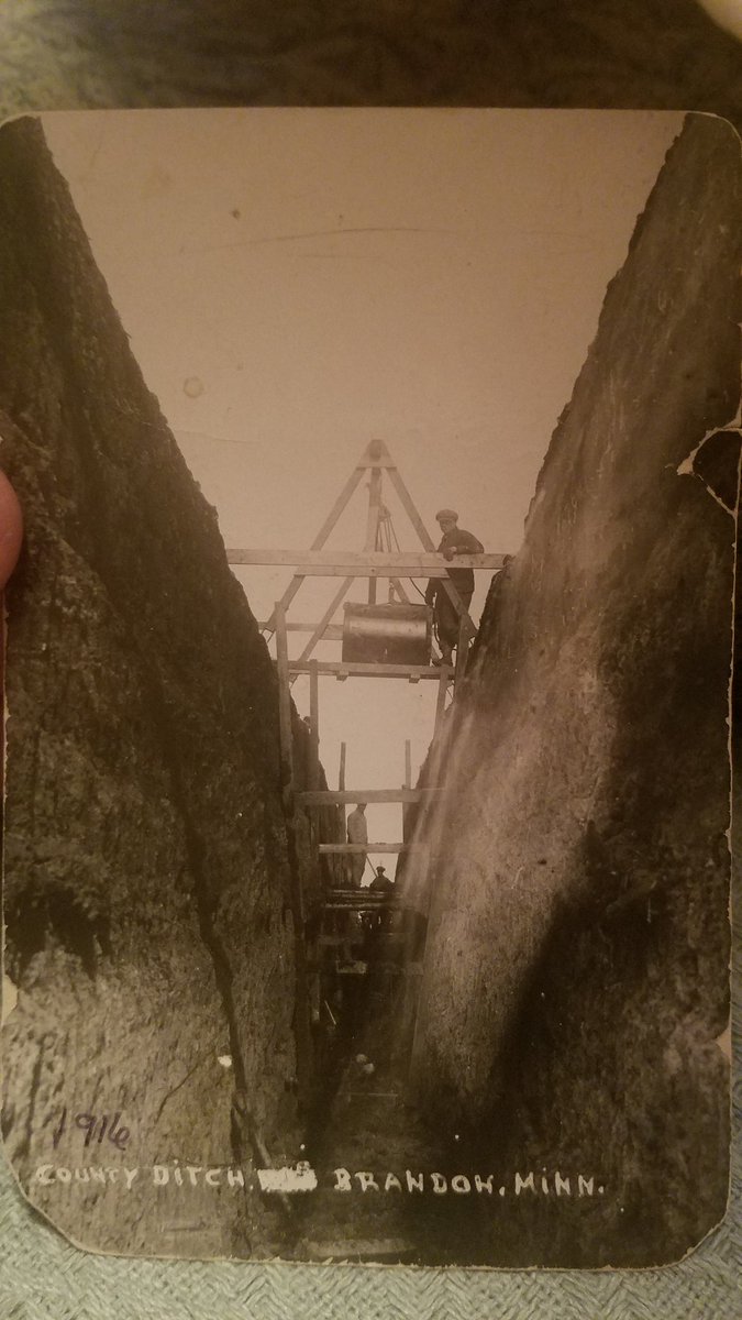 Leetiling1's tweet photo. My stepfather showed me this old postcard from 1916. Showed a 24" tile being installed 18 1/2' deep in the middle of February. I have worked on this county tile system and it is still working to this day!! We don't know what work is!! https://t.co/qvihRUogTh