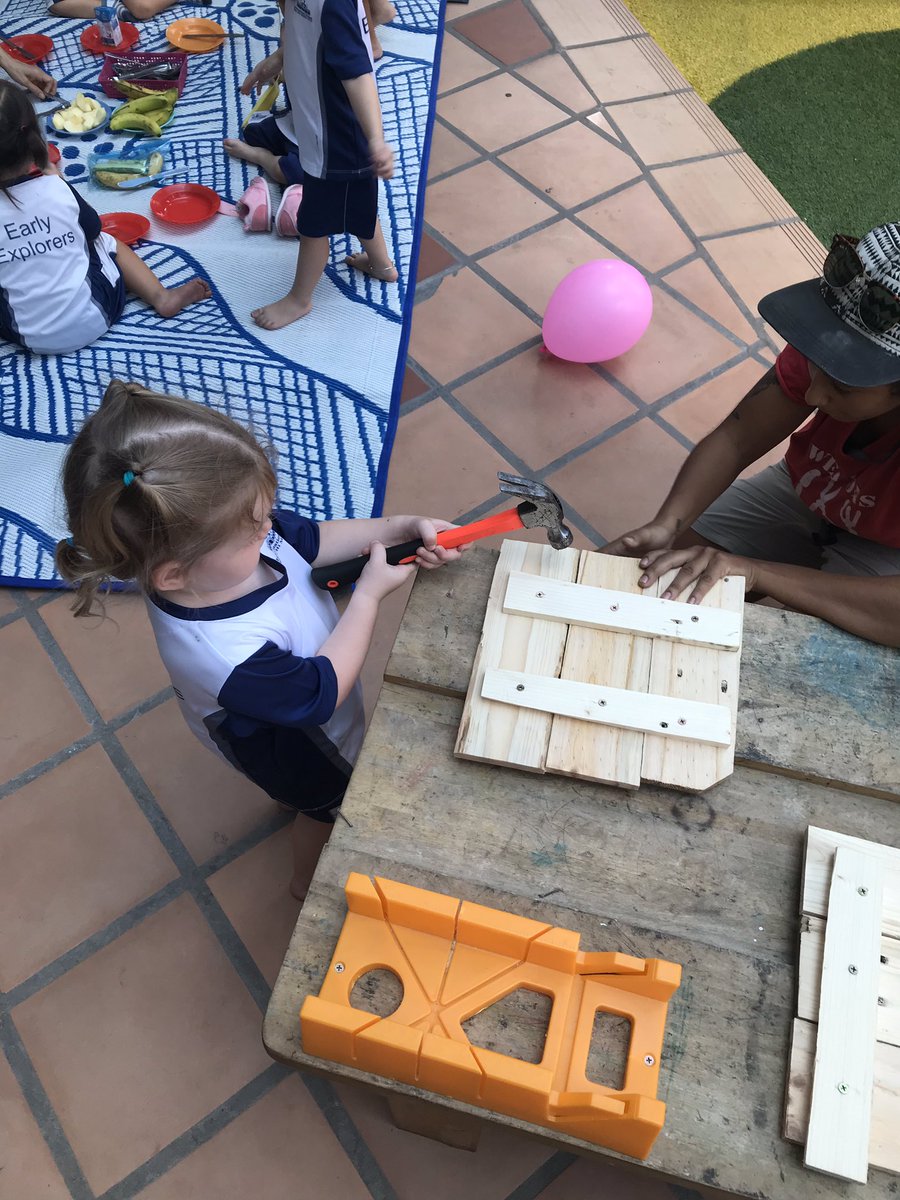 2 year olds with hammers and nails! Our youngest students are helping to create our new community garden areas. #ishcmcIB