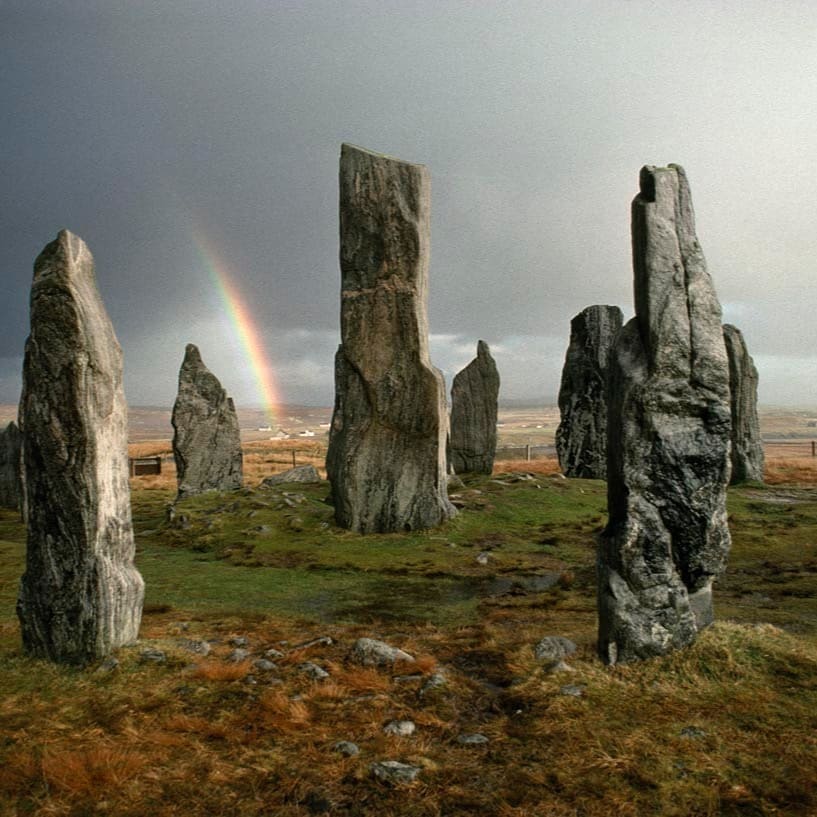 VisitScotland's tweet photo. As if a visit to the Callanish Standing Stones could be made any more magical! 🌈 #OHouterhebrides 📍 #IsleofLewis, @OuterHebs 📷 IG/macduffeverton https://t.co/lhr2sBTNdv