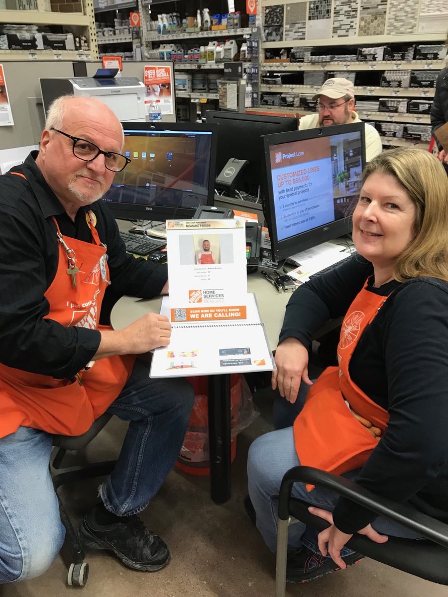 COS Ron Gordick and D23 specialist Loraine Varrone with tech sheet display stand