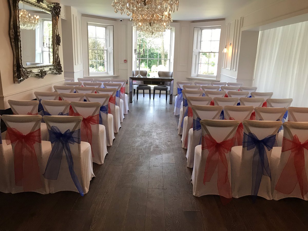 Beautiful red and blue theme. Loved doin this. Contact for a bespoke quote #weddings #weddingdecor #weddinghire #chaircovers #chesterfieldweddings