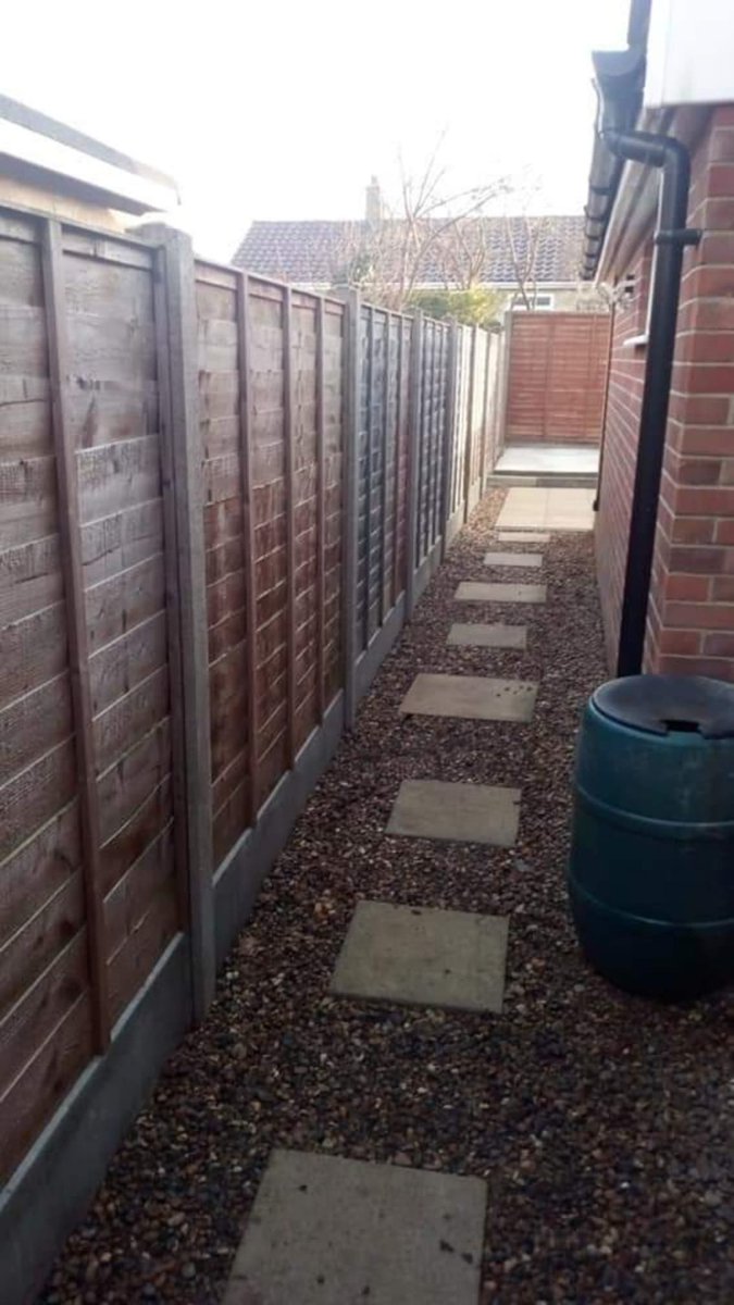 Here we have reused old slabs to create a new fresh look including new drainage. Also we've reused the original fence panels with new gravel boards and concrete posts and a concrete pad for a shed base.
