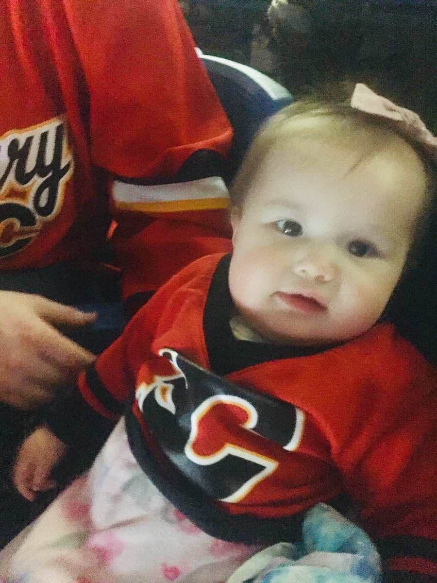 FeliciaHYap's tweet photo. Gwyneth’s 1st #flames game at the @YYCSaddledome #CofRed https://t.co/OjnBrGzZIG