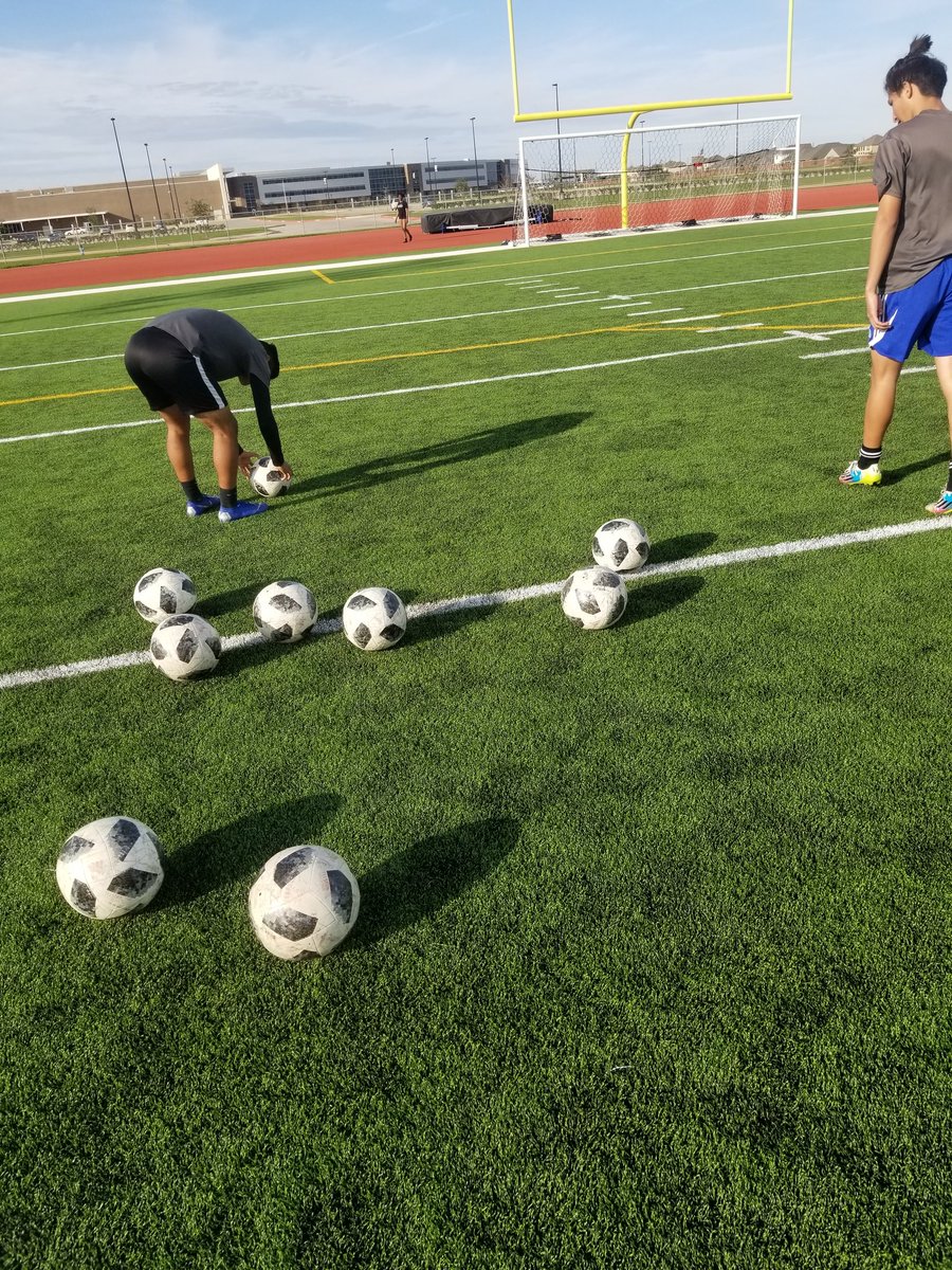 CPtigersoccer's tweet photo. Two guys and a bunch of soccer balls. When players want to stay and work free kicks after practice, you stay and work free kicks. Always encouraged to see extra effort! #liveuncomfortable #year3 #bettereachday https://t.co/h7rF9tfVis