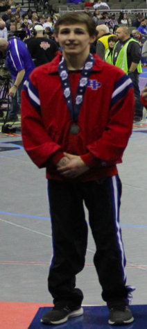 DarronArlt's tweet photo. This kid losses a heartbreak match and what does he do...brings his opponents sweats to him from the far side of the arena while he was being interviewed. There is no greater class act in NE HS wrestling than Logan Russell.
@HPCWrestling 
@Huskermat 
@NEBwrestle 
@PirateGrapplers https://t.co/Mr8BlH9X4u