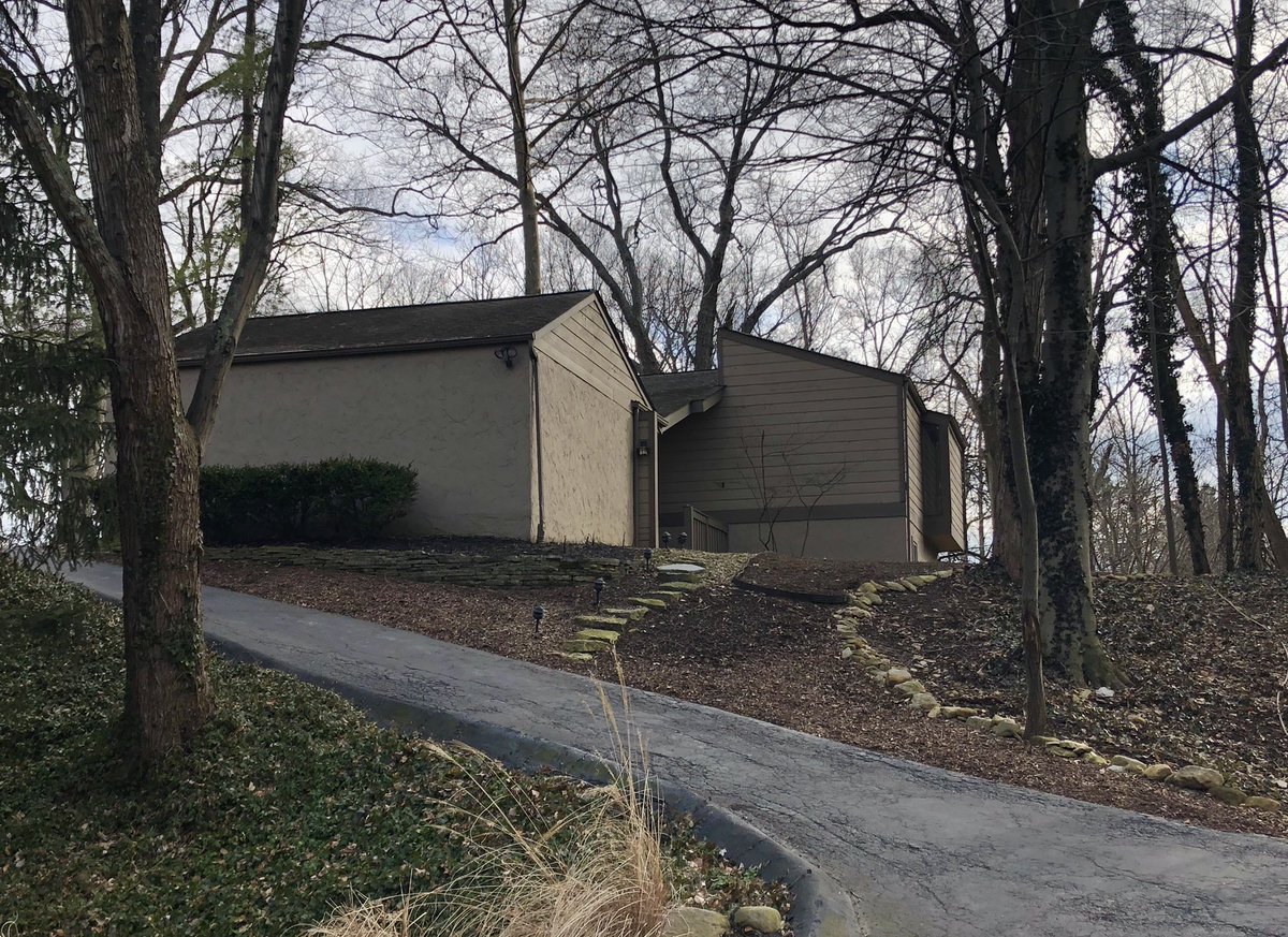 This 1974 home in suburban Hilliard, OH sits on a beautiful property, the backyard looking over a wooded ravine