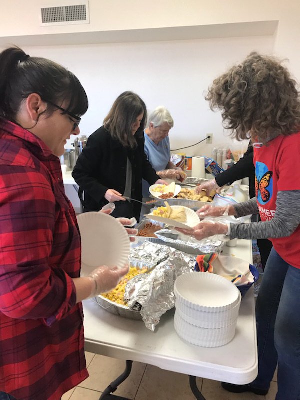 NEAToday's tweet photo. When a shelter for migrant kids and their families ran out of supplies, our members bought food, prepared it and served it, on a holiday weekend! @txstateteachers @NoelCandelaria @LaMissMarquez @ieanea #teachinforfreedom #classroomsnotcages @NEAHCNews https://t.co/I04zjXfszl