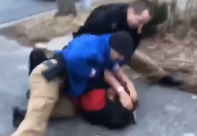 Newsweek's tweet photo. Delaware police officer caught on camera repeatedly punching teenage boy in the head https://t.co/r0sWlLoXHf https://t.co/C6ObWxctYs