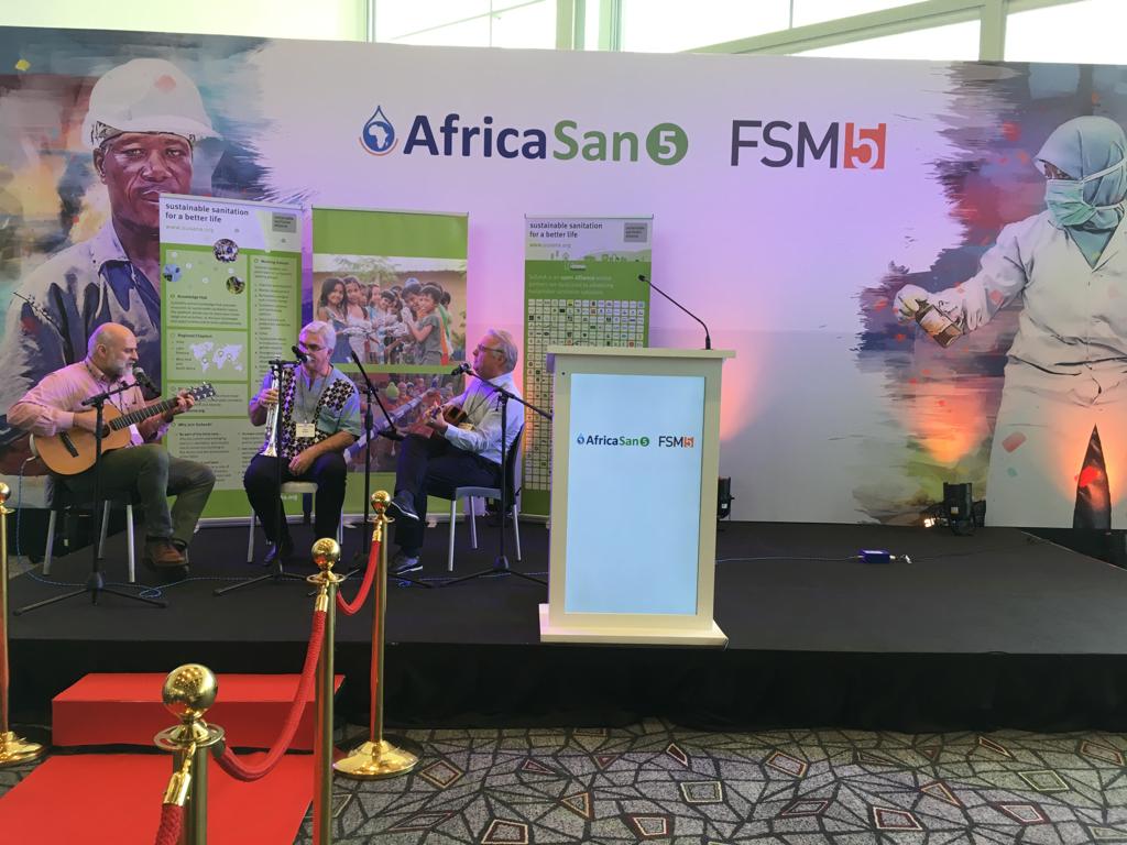 susana_org's tweet photo. The Green Sanitation Band live on stage jamming for the SuSanA Network at the FSM5 & AfricaSan5 conference in Cape Town.
Come learn more about SuSanA at 16:00 at our booth!
#sustainablesanitation #musicfordevelopment #FSM5 #AfricaSan5 @FSM5_Capetown https://t.co/bwDsJsjoy6