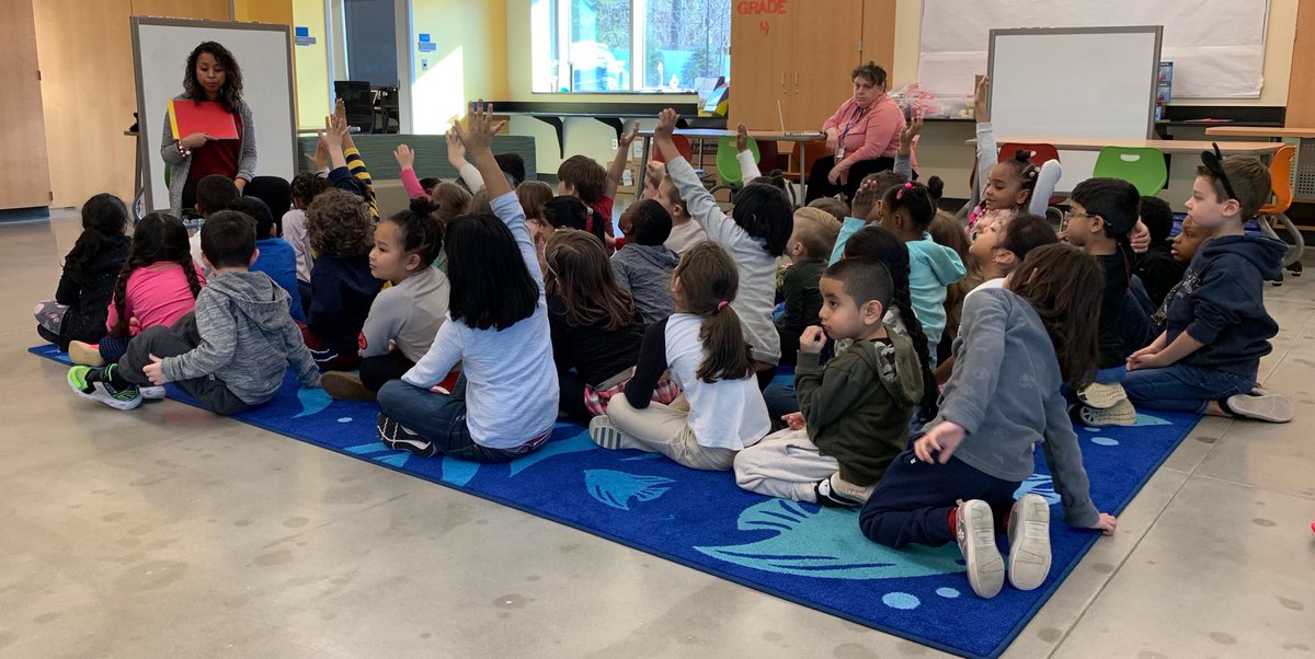 Kindergarten listens to a safety lesson.
