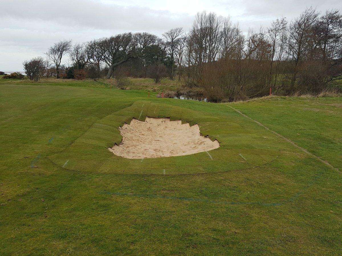 CaldygcGreens's tweet photo. Both of the compost windrows now turned and the 8 tonner is now clearing the gorse stumps left by @360GroundCare Lukasz has finished the right hand greensides at 4. All drainage lines on 3 are piped, gritted and topped with rootzone #turfready #winterrunningout https://t.co/DadowMOcPU