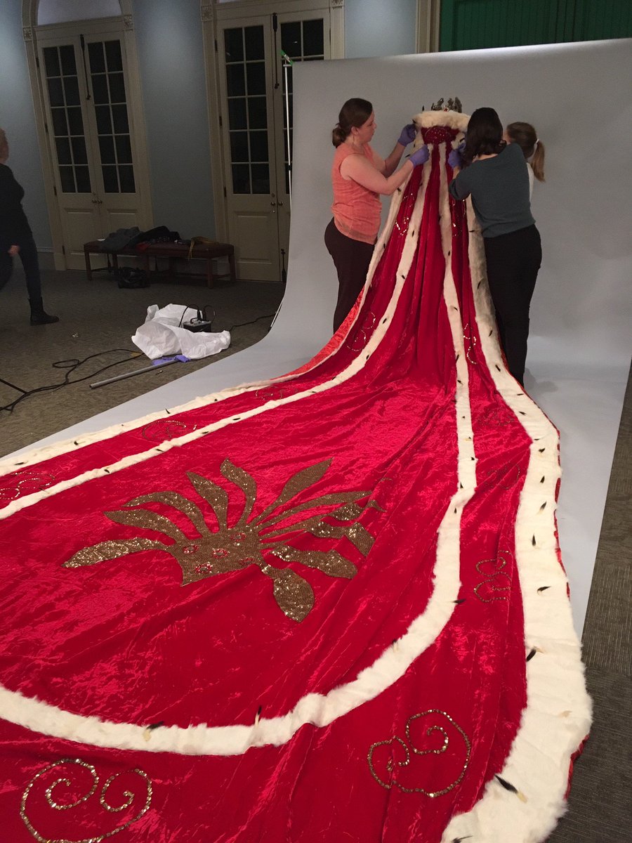 visit_hnoc's tweet image. Laying out items completely allows for condition reporting, cataloging &amp;amp; new research. In fact, staff discovered that the red mantle, which was brought in w/a 1938 king’s costume, doesn’t actually belong to it—the hooks don’t match. #textileresearch #MardiGrashistory