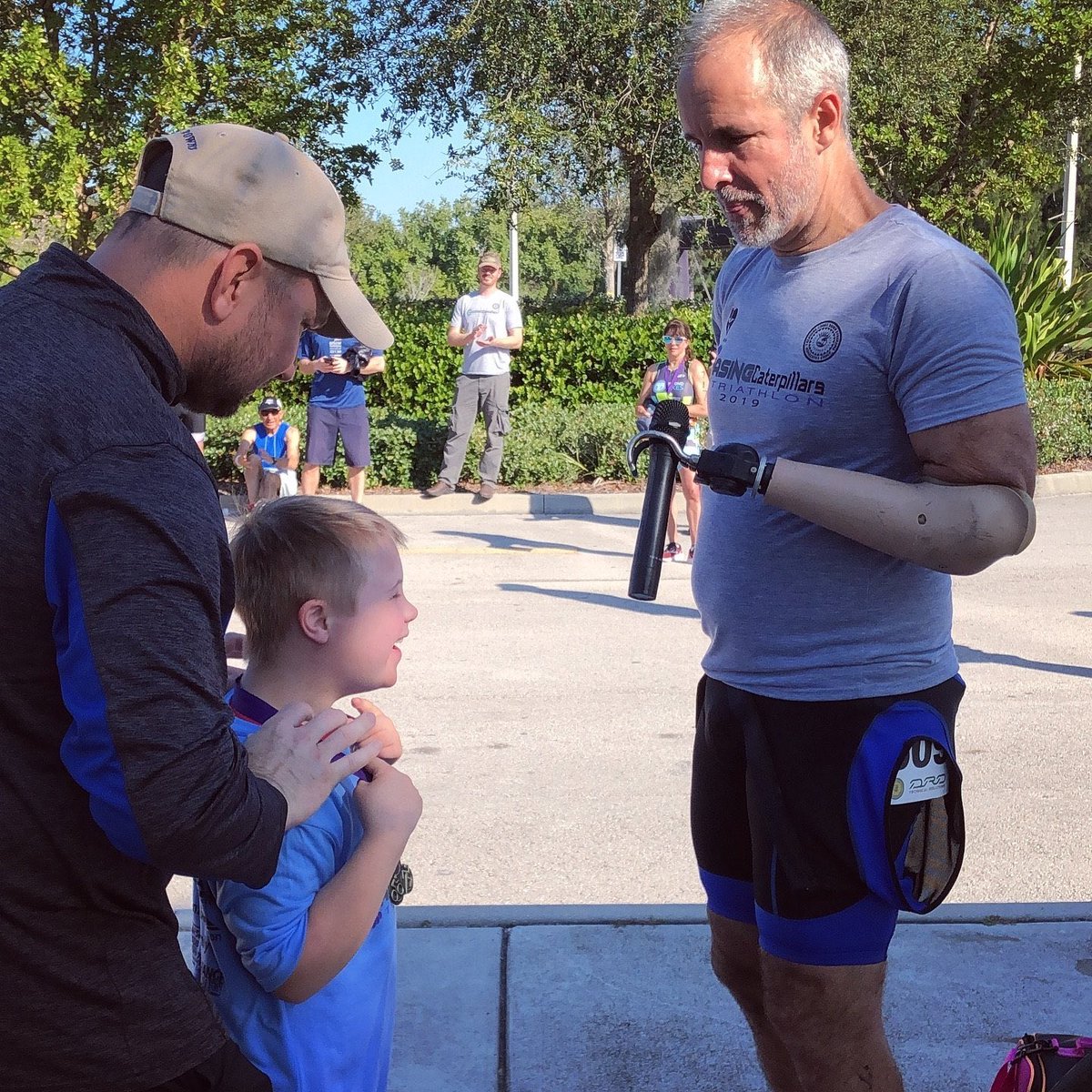 HectorPicard's tweet photo. Chasing Caterpillars TRI on Sunday /presenting my finisher medal to Carson a little boy living with Down Syndrome.
#NoHandsIronman #Motivation #triathlon #swimbikerun #cycling  #triathlete #ironman #triathlontraining #bike #training #trilife #tri #triatlon #swimming #ironmantri https://t.co/DDk7l7sCWc