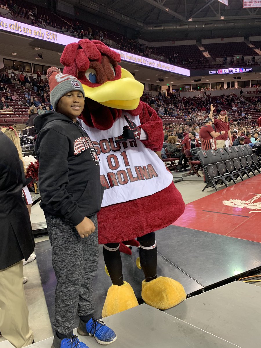 mgba03's tweet photo. We’re back for another exciting @GamecockMBB game! My guy is also here as a @USCDM miracle child and enjoying participating in tonight’s timeout events! Love our #USCDM family!  #MySickleCellWarrior #FTK #ForTheKids https://t.co/8kwtDSxVp2