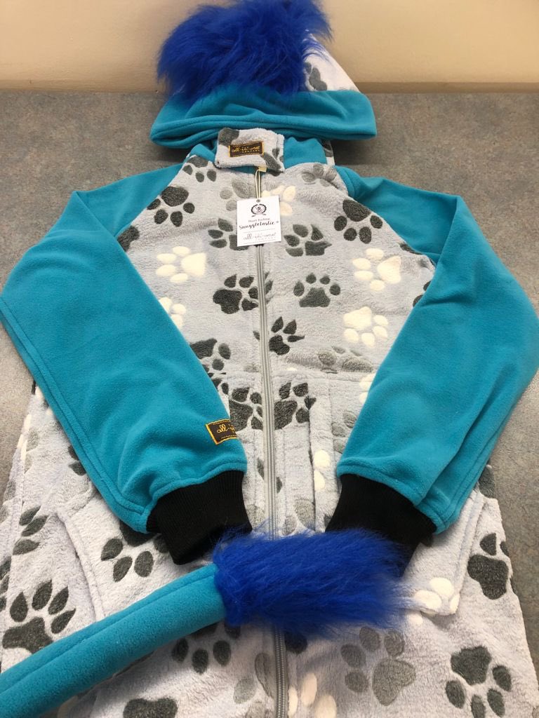 Here’s a Dino 🦕 onesie with a difference. 

It has a lion tail. 

With create your own onesie you become the designer to create the onesie you wish existed. 

Anything is possible on the 3D onesie builder.