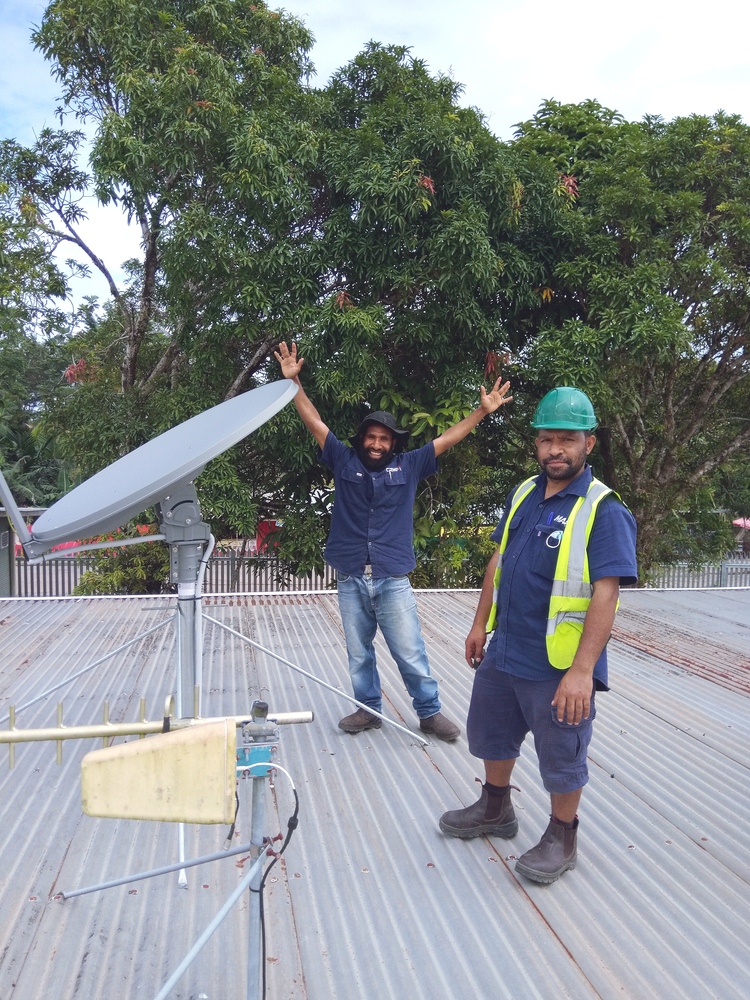 mafcanada's tweet image. #TechyThursday - Here you can see CRMF Technician, Thompson Tawi with MAF IT Support Officer Michael Gena from Mt. Hagen, installing a VSAT for the PNG MAF base at Tabubil and Kiunga!