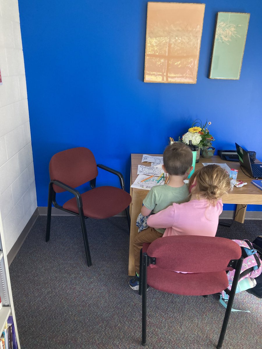 Kindergarten can be hard. It helps to have an older sibling that’s willing to let you sit on her lap. And coloring is always good. ⁦<a href="/WestIrondequoit/">West Irondequoit CSD</a>⁩